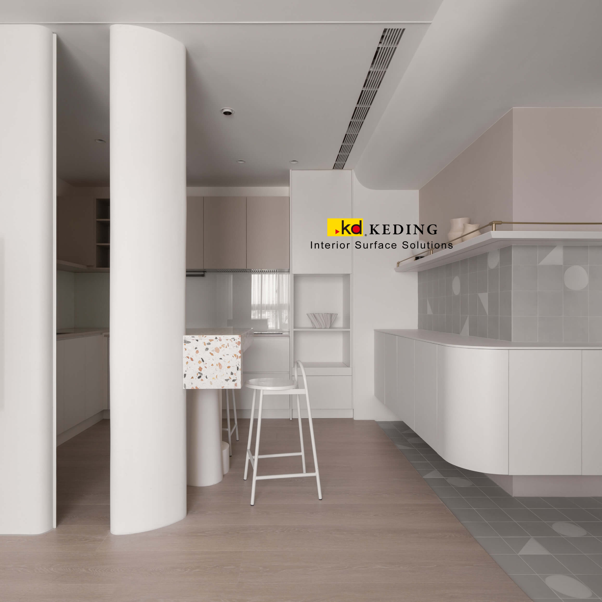 Modern kitchen interior showcasing elegant curved cabinetry and columns finished in smooth, white KD ECO⁺ laminates.