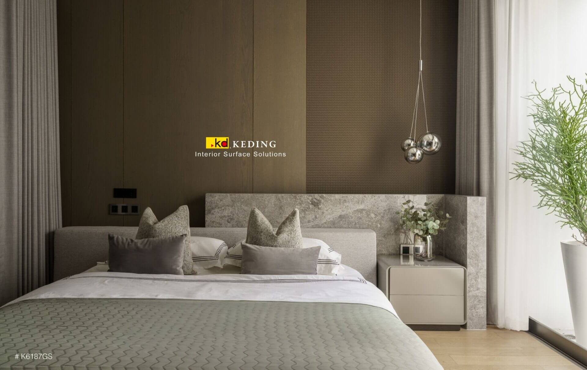 A bedroom decorated with wood panels from Keding.